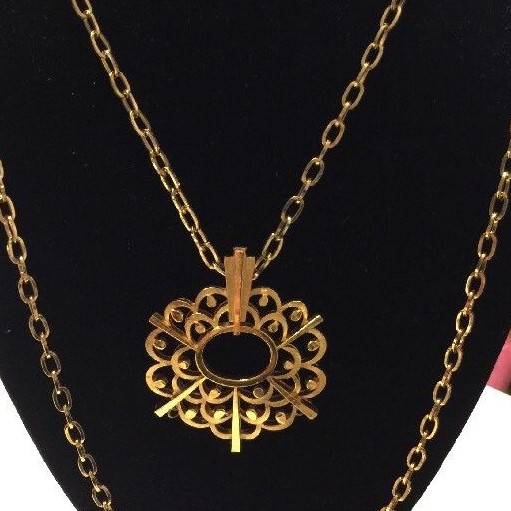 Vintage Trifari gold tone pendant